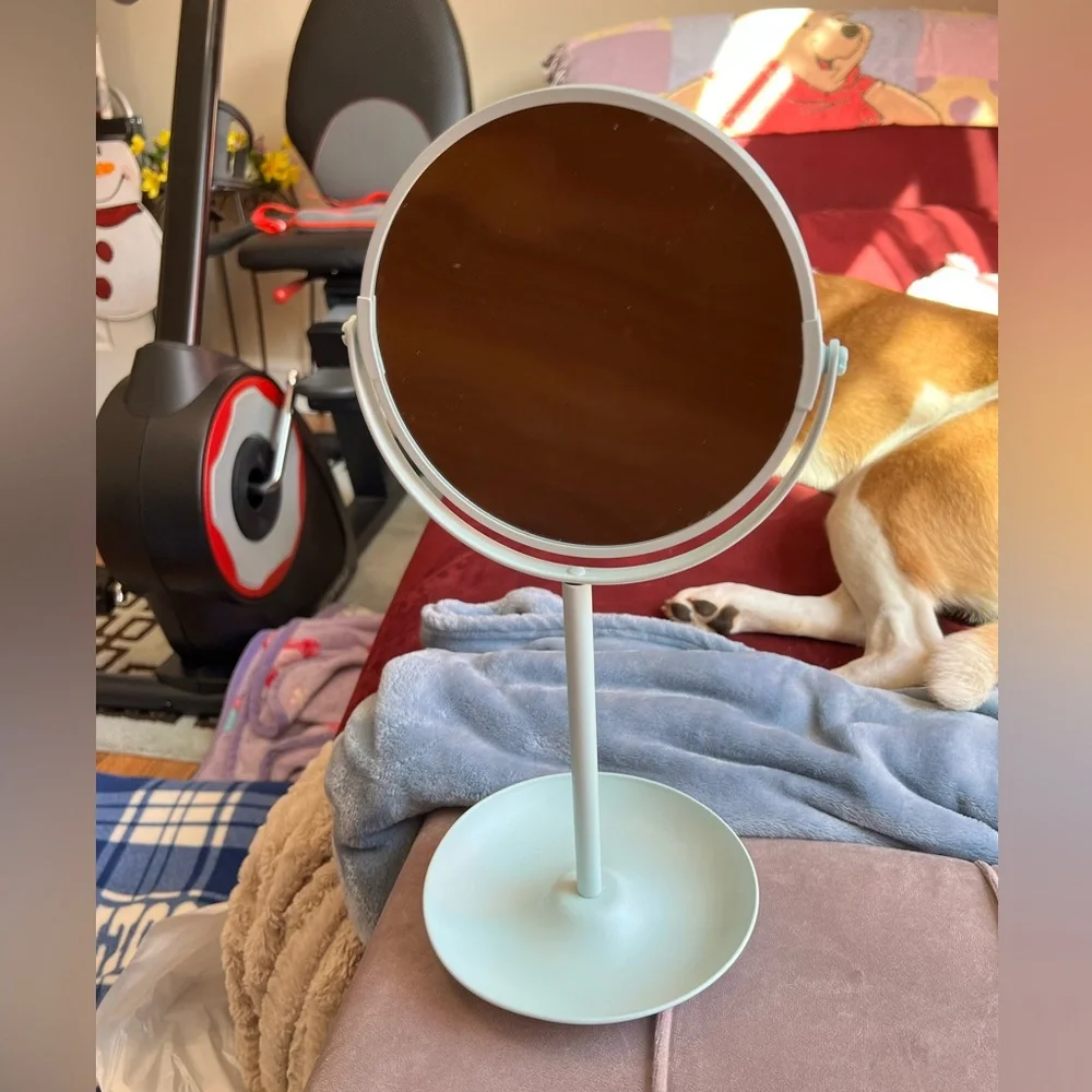 Light teal makeup mirror with handy tray to hold little items